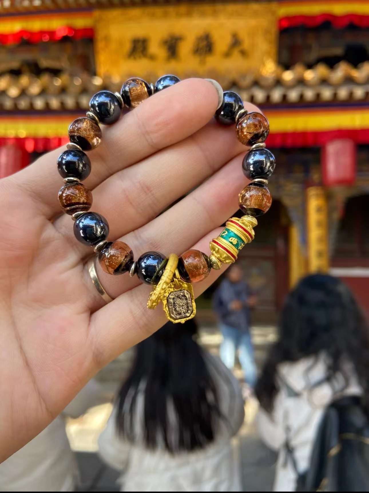 Glazed black porcelain and glazed bracelet from Mount Wutai