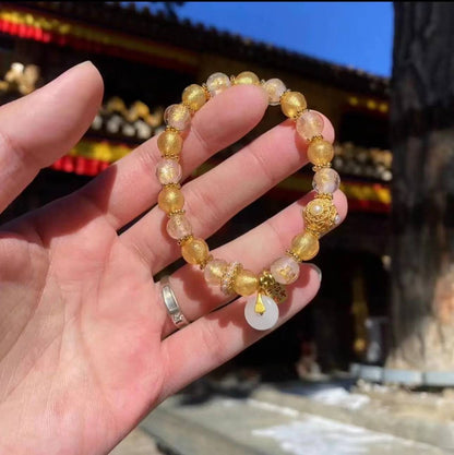 Two-tone glazed bracelet with gold foil from Mount Wutai