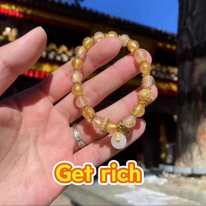 Two-tone glazed bracelet with gold foil from Mount Wutai